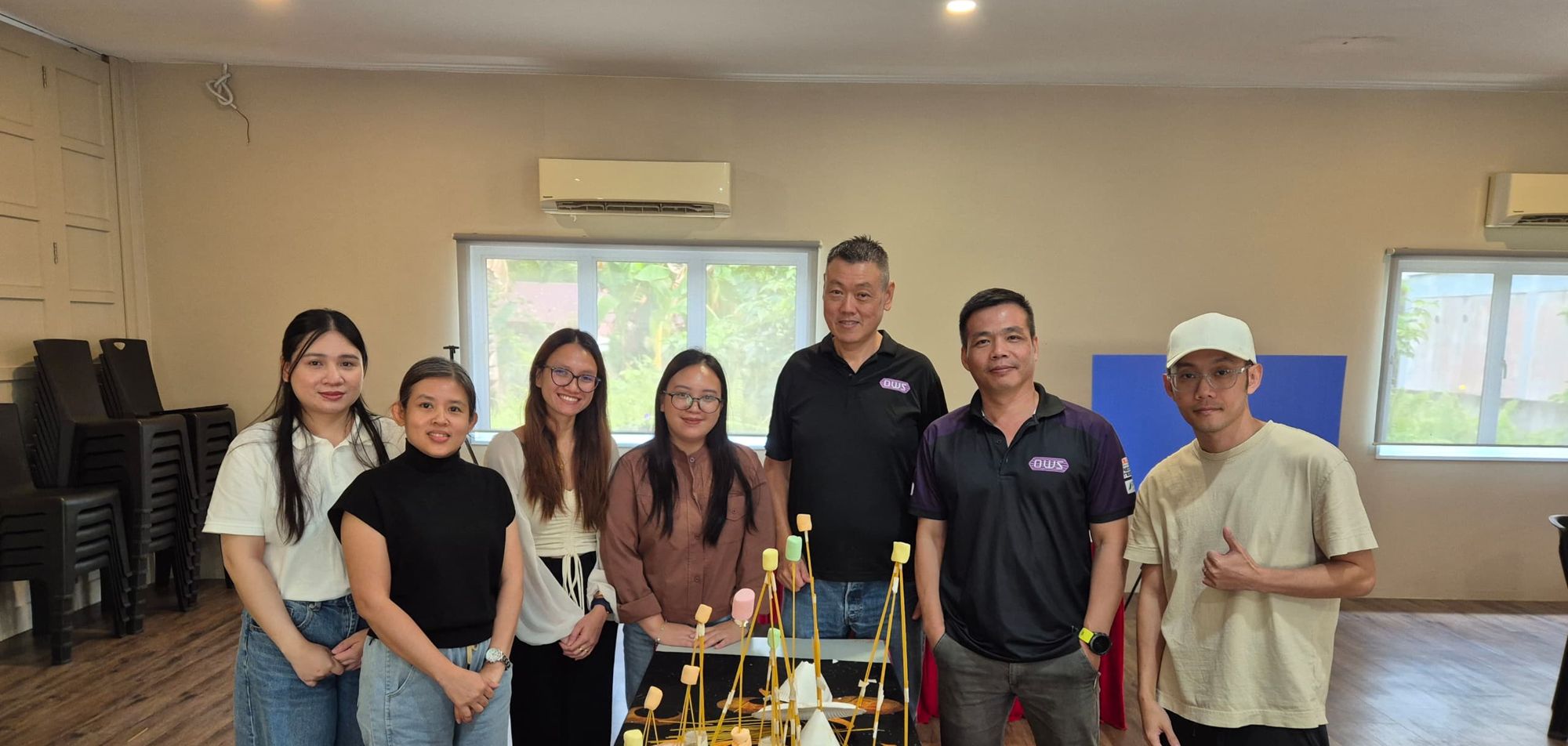 The Aurelion team with clients at a Team Build X session